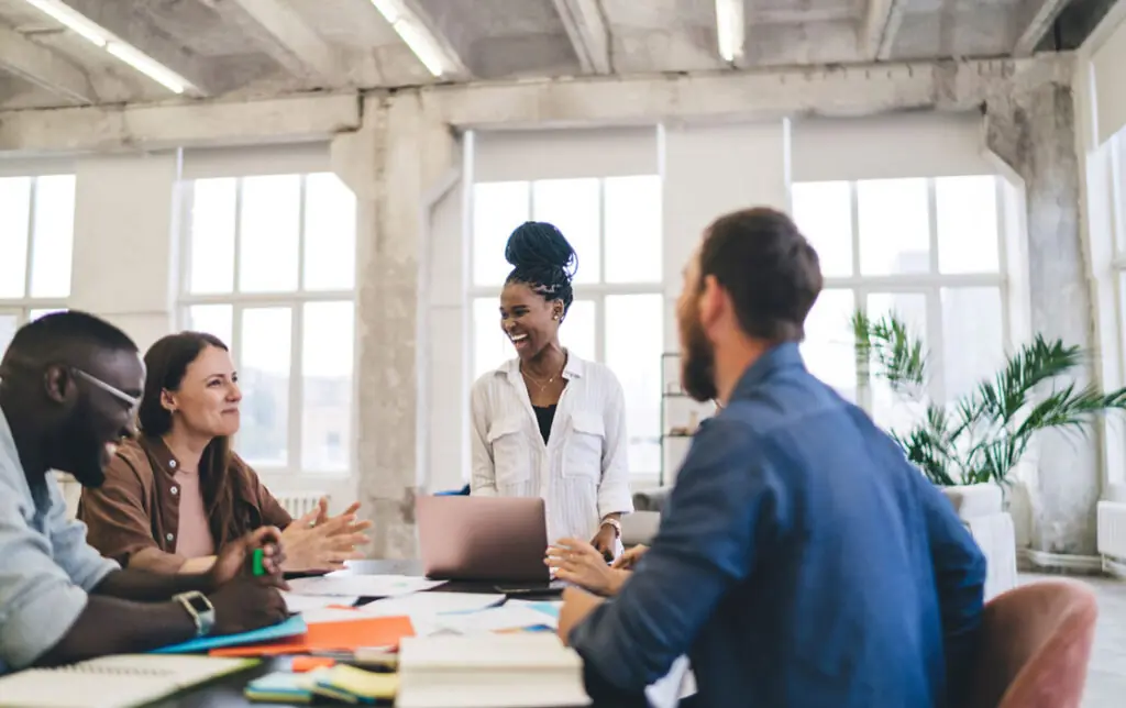 co-workers meeting at table