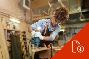 woman using power tools for carpentry