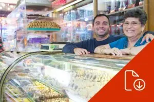 mother and son behind bakery counter