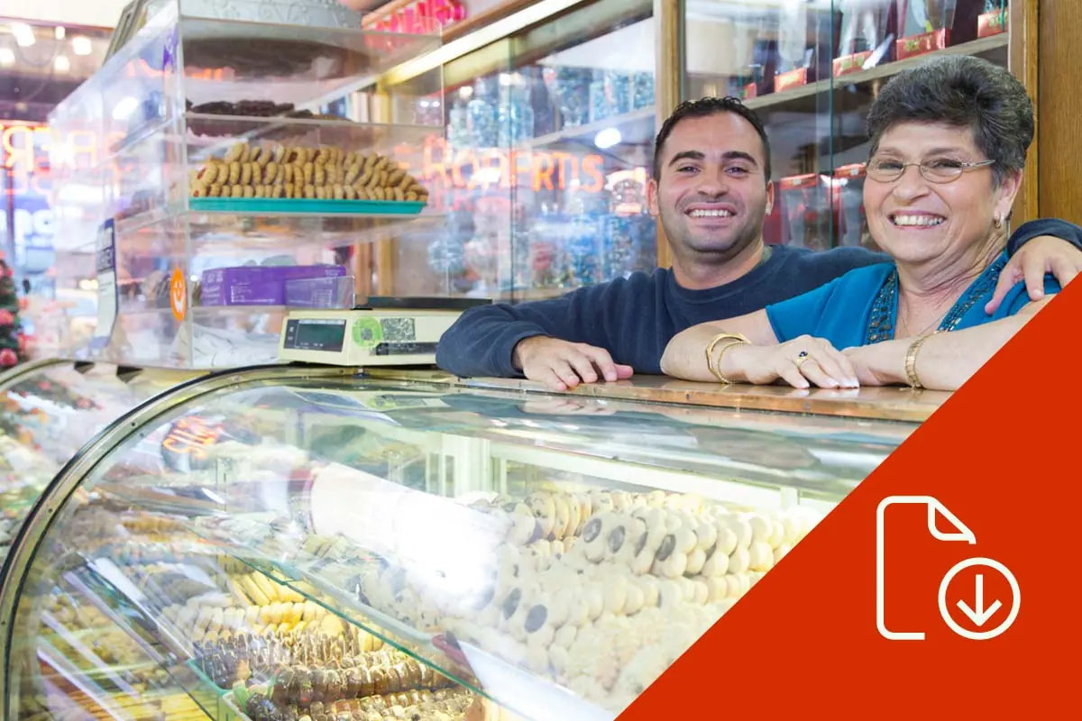 mother and son behind bakery counter